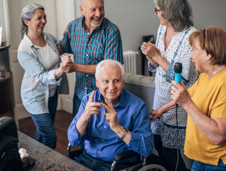 Residents laughing together during a community activity